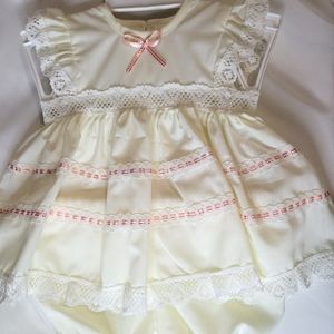 Baby dress 0months in pastel yellow